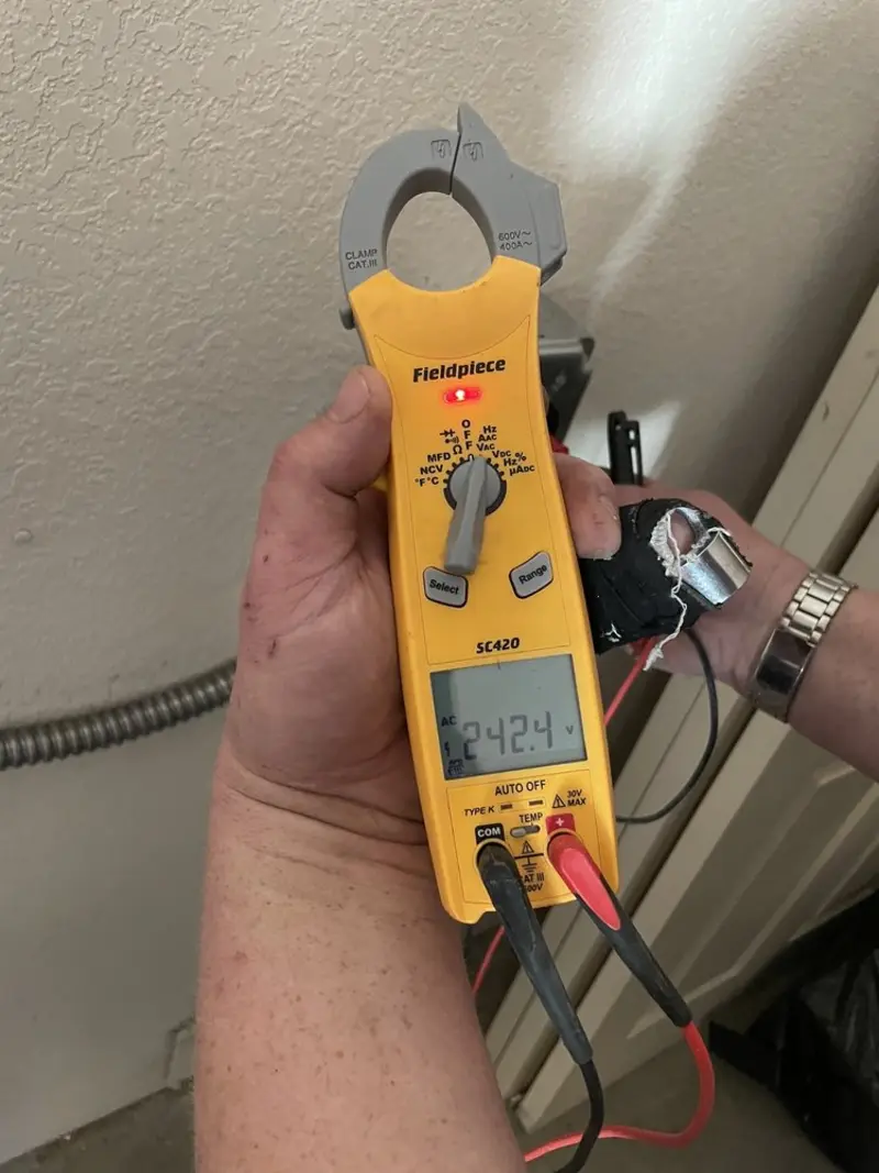 Voltage testing with clamp meter during Circuit Breaker Repair in Wilkshire Hills